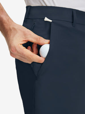 Detail view of front pocket on navy flat front flex cotton blend golf shorts