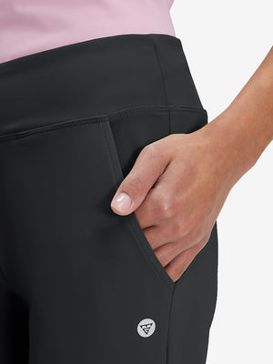 Side view of pocket on black women's high waist stretch golf pants with pockets