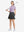 Front full body shot of model exercising in pinkish purple women's breathable 1/4 zip pullover golf shirts