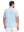 Back upper body shot of model wearing light blue moisture wicking jacquard golf shirts