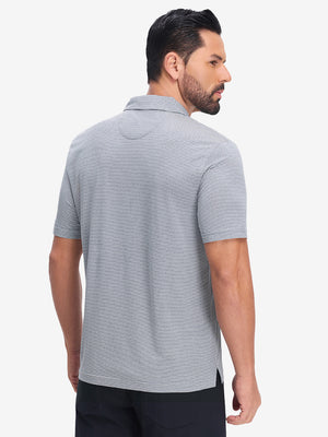 Back half body shot of model wearing navy white comfy breathable pin-stripe texture golf polos