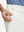 Detail view of front pocket on white flat front flex cotton blend golf shorts