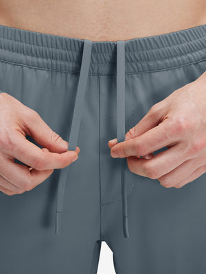 Detail view of elastic waistband on grey blue 4 way stretch breathable workout athletic shorts