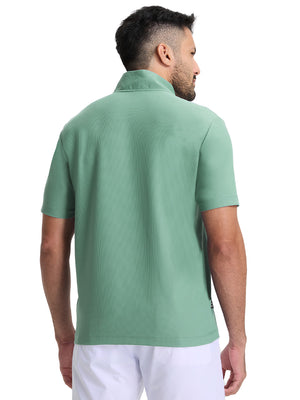 Back upper body shot of model wearing green grey waffle texture 1/4 zip pullover