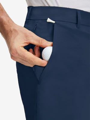 Detail view of front pocket on dark blue flat front flex cotton blend golf shorts