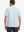 Back view of model in Light Blue Cobalt Stripe Performance Stripe Golf Shirt