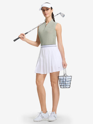 Front full body shot of model exercising in moss green white women's q-zip pin striped texture golf shirts