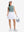 Front full body shot of model wearing dusty blue women's moisture-wicking mock neck sleeveless golf tops