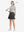 Front full body shot of model exercising in light grey women's breathable 1/4 zip pullover golf shirts
