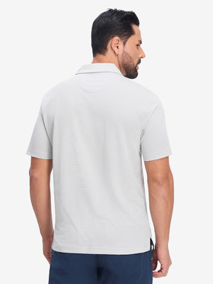 Back half body shot of model wearing light grey white comfy breathable pin-stripe texture golf polos