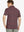 Back half-body view showing the tailored fit and stripe continuity of the Rusty Red Navy Yarn Dyed Stripe Polo