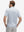 Back half-body view of model wearing the colorful wine glass 4 way stretch print collared polo shirt, highlighting the rear silhouette