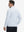 Back upper body view of the lightweight print polo in light gray irregular pattern, model turns slightly with relaxed pose.