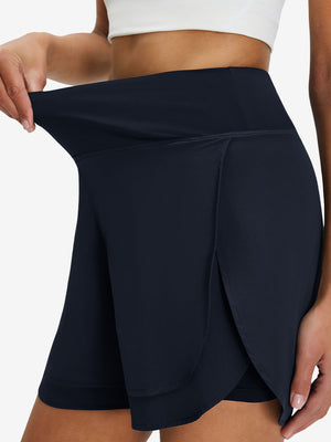 Detail view of elastic waistband on navy blue women's gym golf shorts with liner pocket