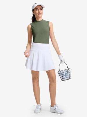 Front full body shot of model wearing mossy stone women's moisture-wicking mock neck sleeveless golf tops