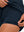 Inner side detail view in navy of women's lightweight golf dress with 2 pockets.