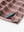 Hem slit detail of WINE RED STRIPE Performance Yarn Dye Striped Polo highlighting stitching and finish