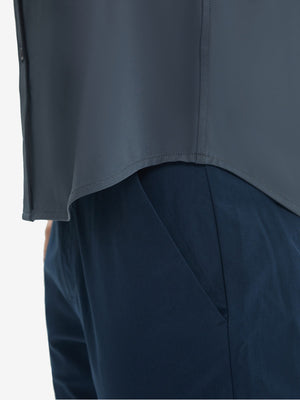 Detail view of hem on dark grey cool print plain button up shirts