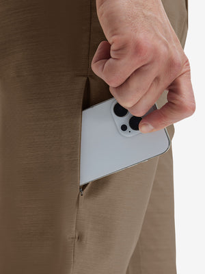 Detail view of side pocket on tobacco brown straight fit lightweight dress golf pants