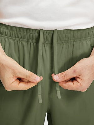Pantalones Deportivos Ligeros Impermeables con Bolsillos con Cremallera
