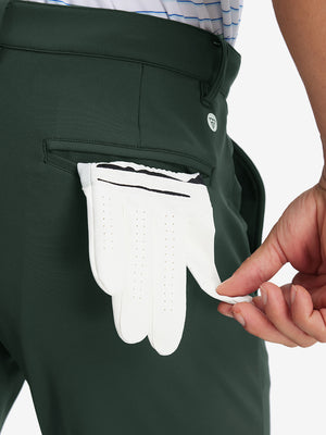 Back pocket detail of Golf Lightweight Fleece Lined Dress Pants in forest green
