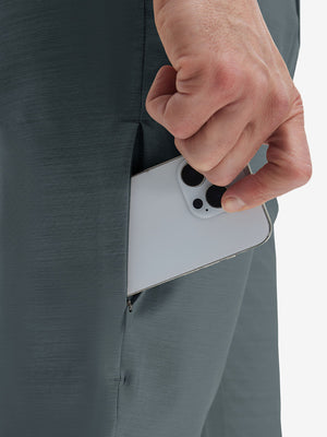 Detail view of front pocket on iron grey straight fit lightweight dress golf pants