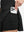 Detail view of inner pocket on black women's high waisted golf skirts with 4 inner pockets