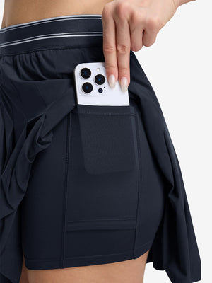 Detail view of inner pocket on navy blue women's moisture-wicking athletic tennis skirts