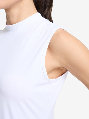 Detail view of armhole on white women's moisture-wicking mock neck sleeveless golf tops