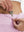 Detail view of inner pocket on light pink women's gym golf shorts with liner pocket