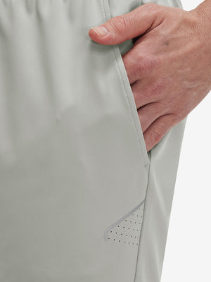 Side view of pocket on silver gray 4 way stretch breathable workout athletic shorts
