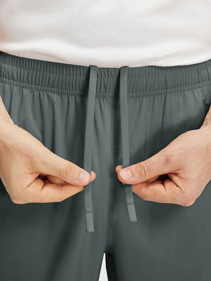 Pantalones Deportivos Ligeros Impermeables con Bolsillos con Cremallera