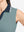 Detail view of armhole on dusty blue women's collared v neck quick dry tank tops
