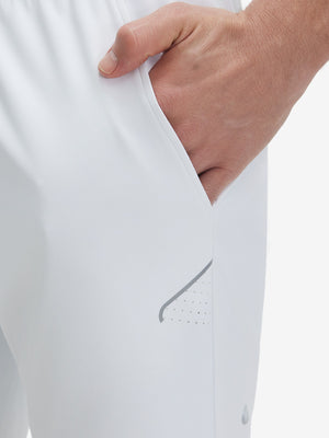 Side view of pocket on white 4 way stretch breathable workout athletic shorts