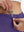 Detail view of inner pocket on dark purple women's gym golf shorts with liner pocket