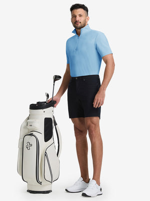Front full body shot of model exercising in light blue waffle texture 1/4 zip pullover
