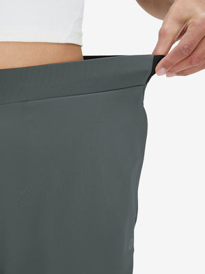 Detail view showing waist stretch on dark grey women's lightweight athletic sweatpants