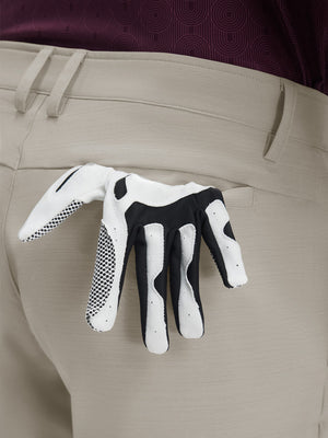 Detail view of back pocket on fossil flat front hybrid golf shorts