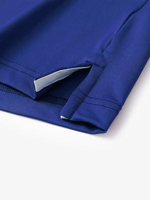 Hem slit detail of KLEIN BLUE Moisture Wicking Color Block Polo Shirt highlighting stitching and finish.