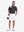 Front full body with golf bag in black heather of performance heather contrast collar polo shirts.