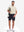 Front full body shot of model wearing beige white comfy breathable pin-stripe texture golf polos