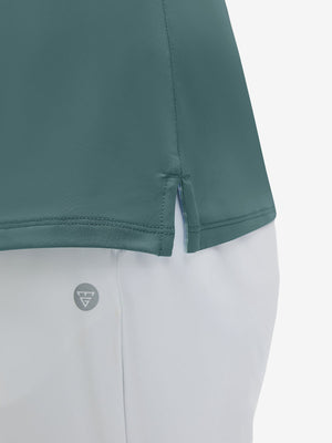 Detail view of hem on dusty blue women's athletic quarter zip tank tops