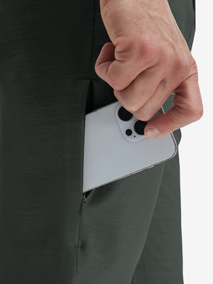 Detail view of side pocket on dark charcoal straight fit lightweight dress golf pants