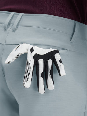 Detail view of back pocket on newport blue flat front hybrid golf shorts