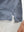 Detail view of hem on dark blue diamond premium ribbed collar print polo shirts
