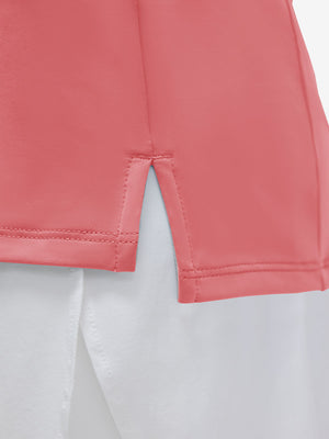 Detail view of hem on pink women's 4 buttons golf polo shirts
