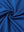 Close-up of cobalt your favorite jacquard polo fabric showing textured knit and soft finish.