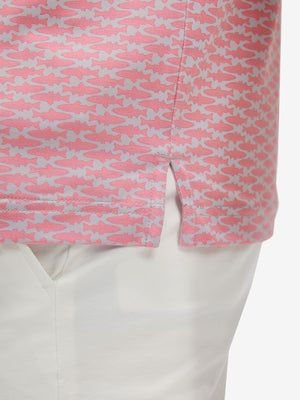 Detail view of hem on pink small fish premium ribbed collar print polo shirts