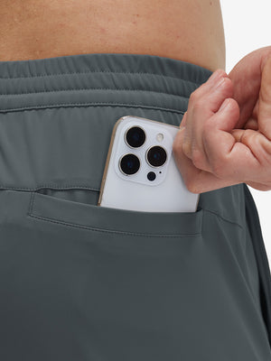 Back view of pocket on dark grey 4 way stretch breathable workout athletic shorts