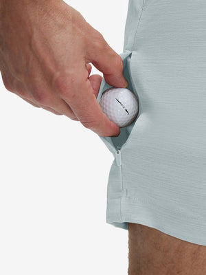 Detail view of stretch fabric on newport blue flat front hybrid golf shorts